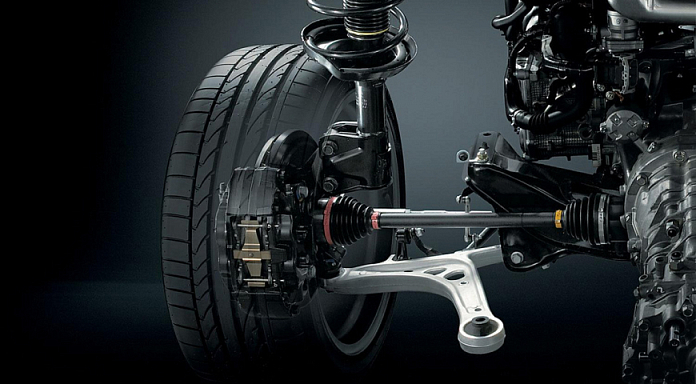 Замена передней стойки амортизатора в автосервисе Диалог Авто